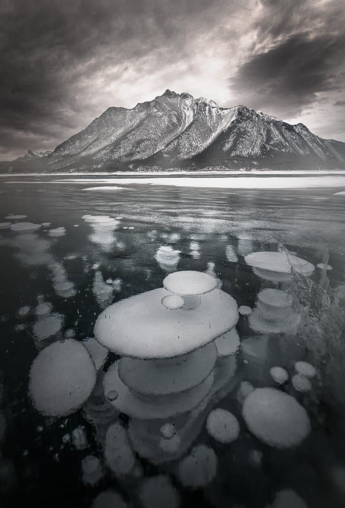 Frozen Bubbles Mountain Lake by Liwen Tao — canvas wall art