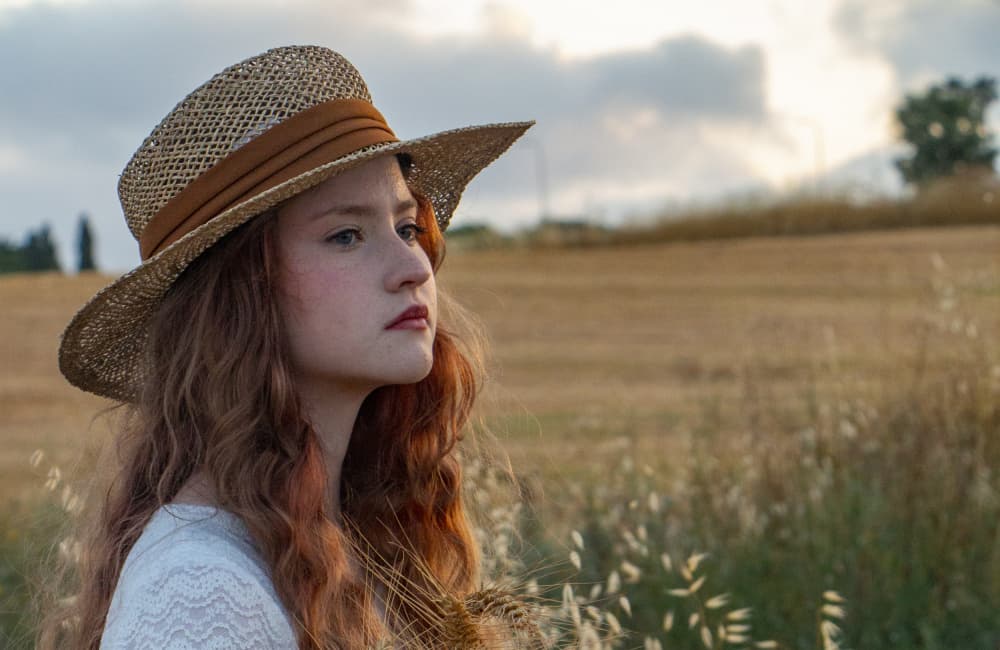 Pensive Girl Golden Field by Anna Kogan — canvas wall art