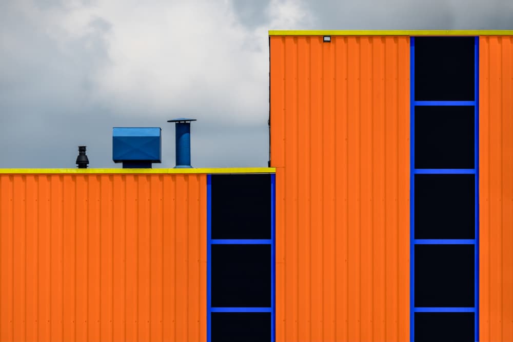 Vibrant Orange Architecture by wiebe wilbers — canvas wall art
