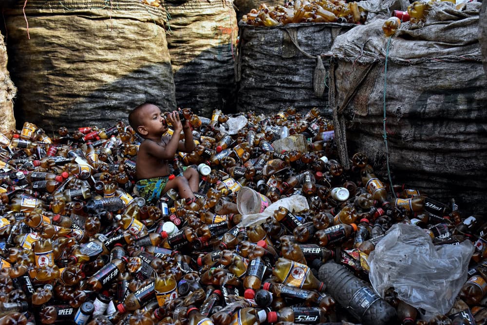 Child in Plastic Waste by MD MAHABUB HOSSAIN KHAN — canvas wall art