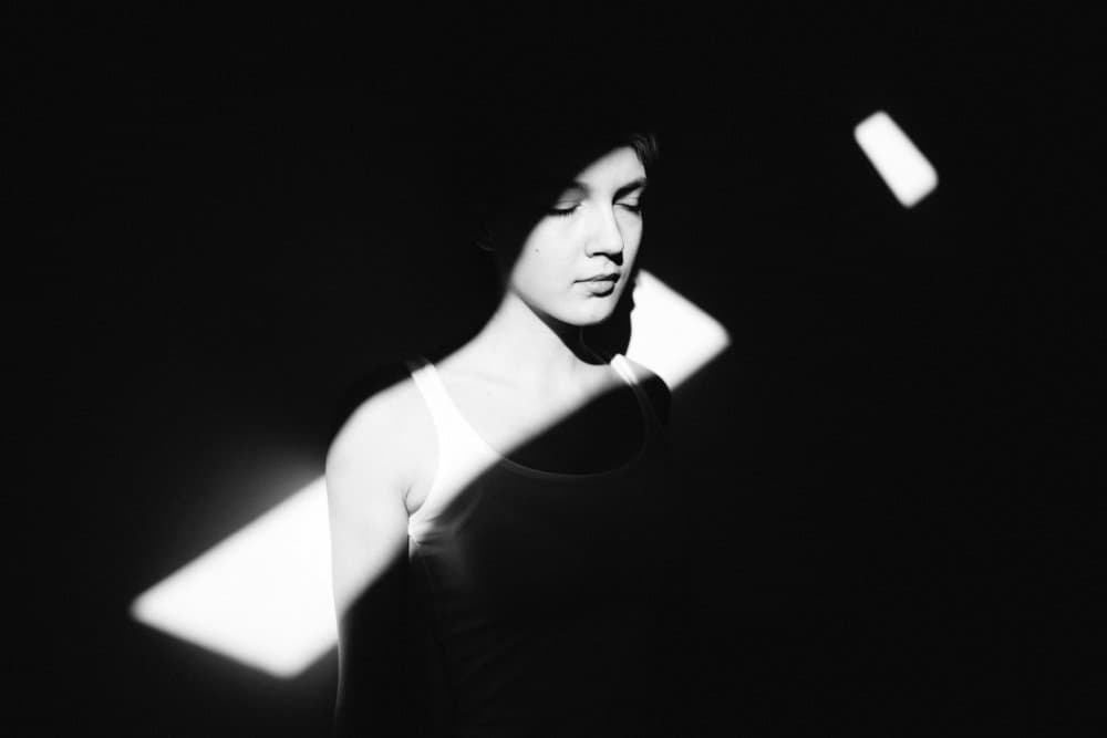 Serene Woman in Light by Borislav Kornienko — canvas wall art