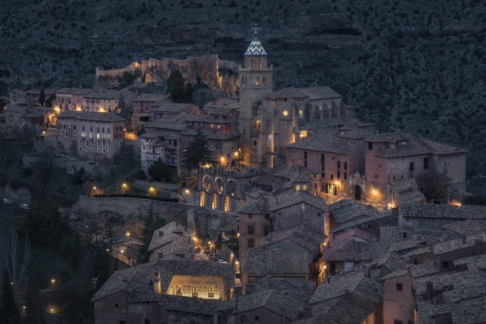 Historic Hillside Village Night by Oskar Baglietto — canvas wall art