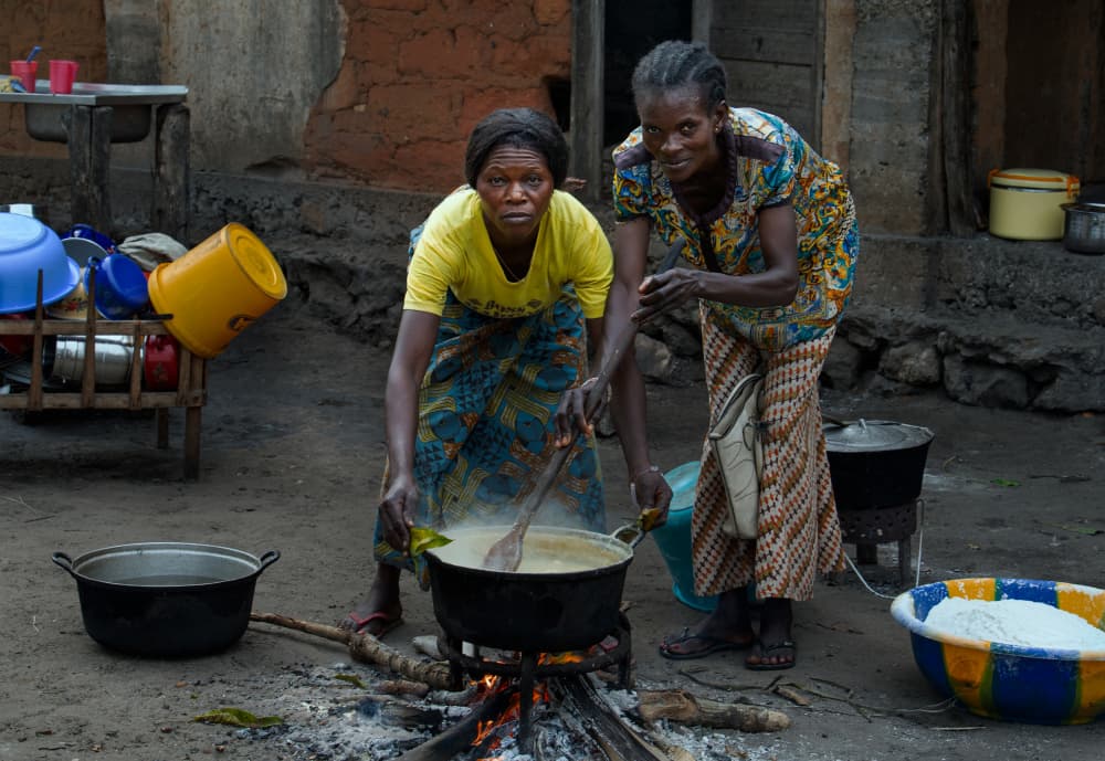 African Women Cooking by Joxe Inazio Kuesta Garmendia — canvas wall art