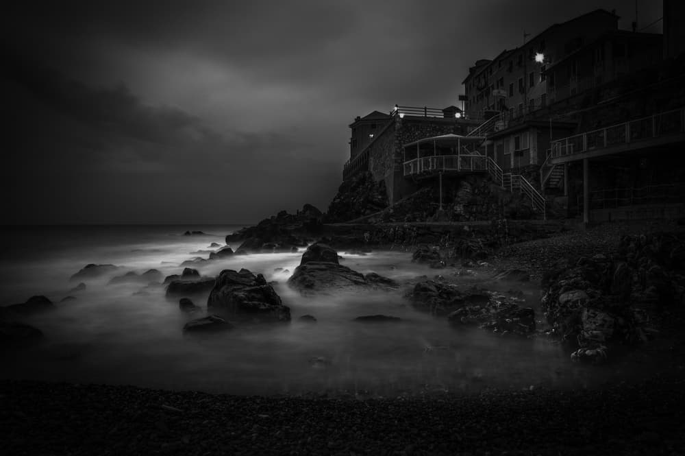 Moody Coastal Village by Alessandro Traverso — canvas wall art