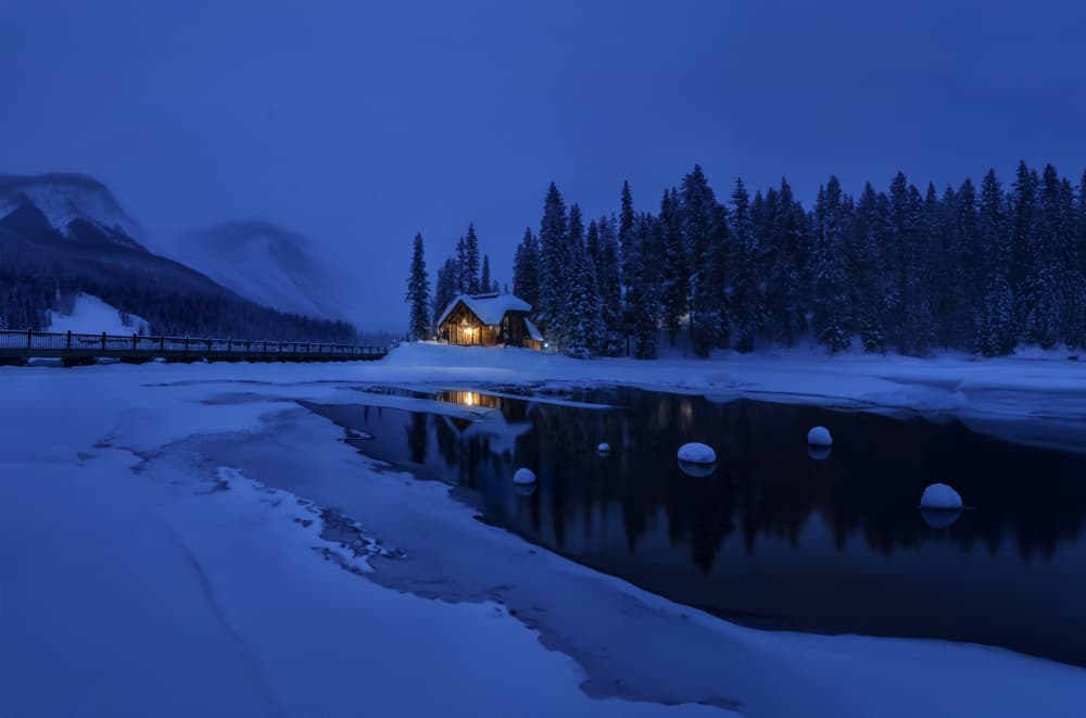 Winter Night Cabin Reflection by NanZ — canvas wall art