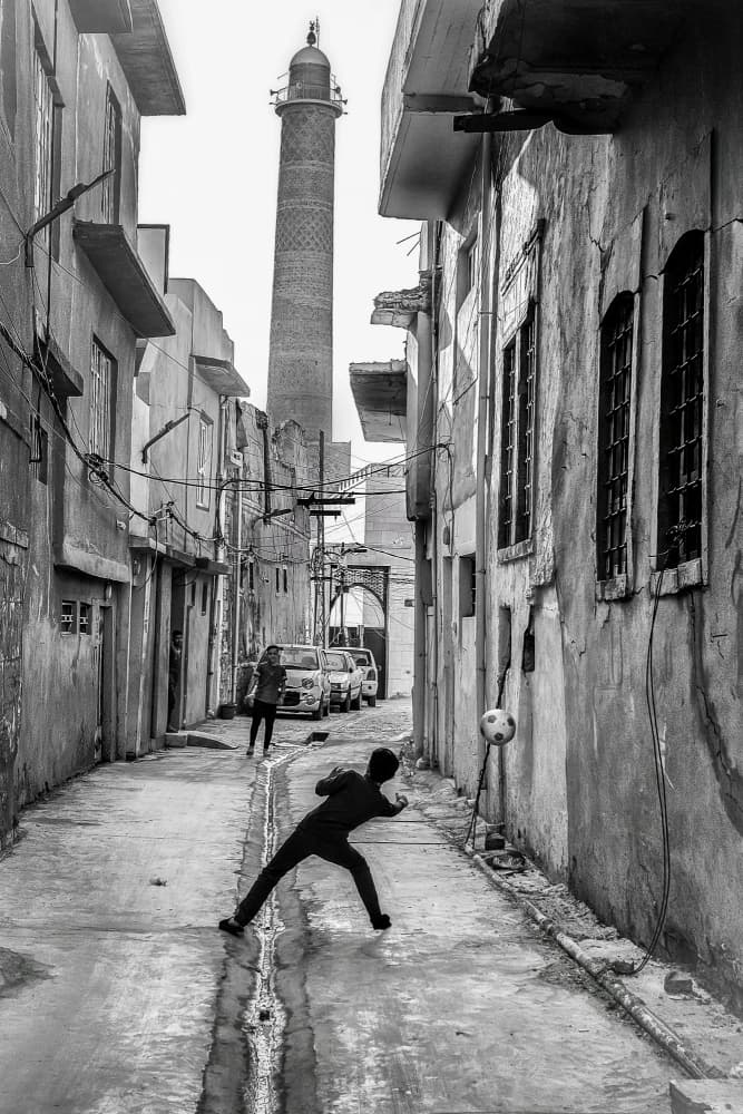 Historic Street Football by Bashar Alsofey — canvas wall art