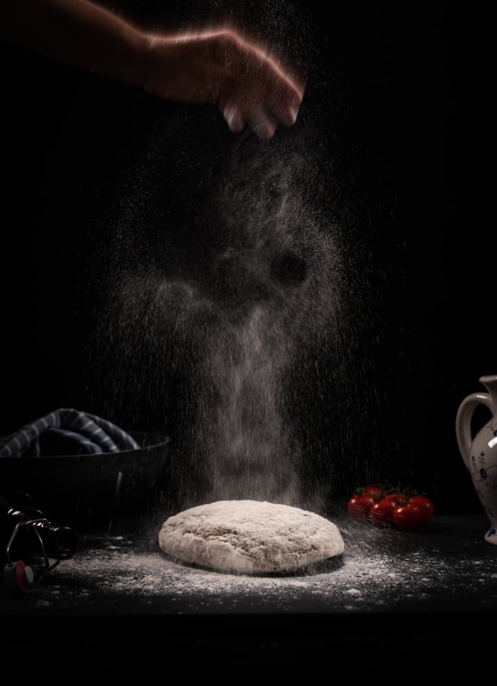 Hands Baking Fresh Dough by Dorte Irene Sattrup Lund-Nielsen — canvas wall art