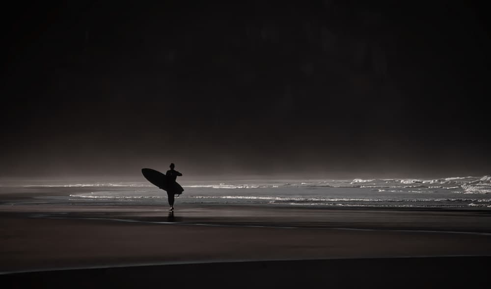 Moody Ocean Surfer by Jesus Concepcion Alvarado — canvas wall art