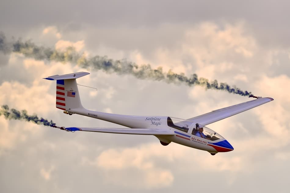 Glider Trailing Smoke by Andrew J. Lee — canvas wall art