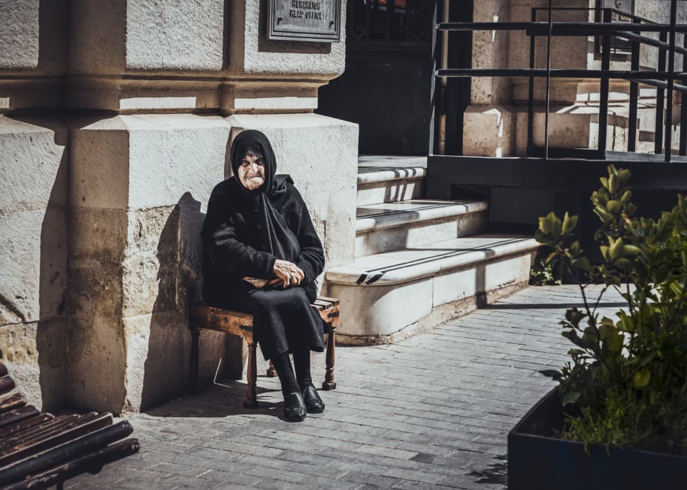 Pensive Old Woman by Normunds Kaprano — canvas wall art