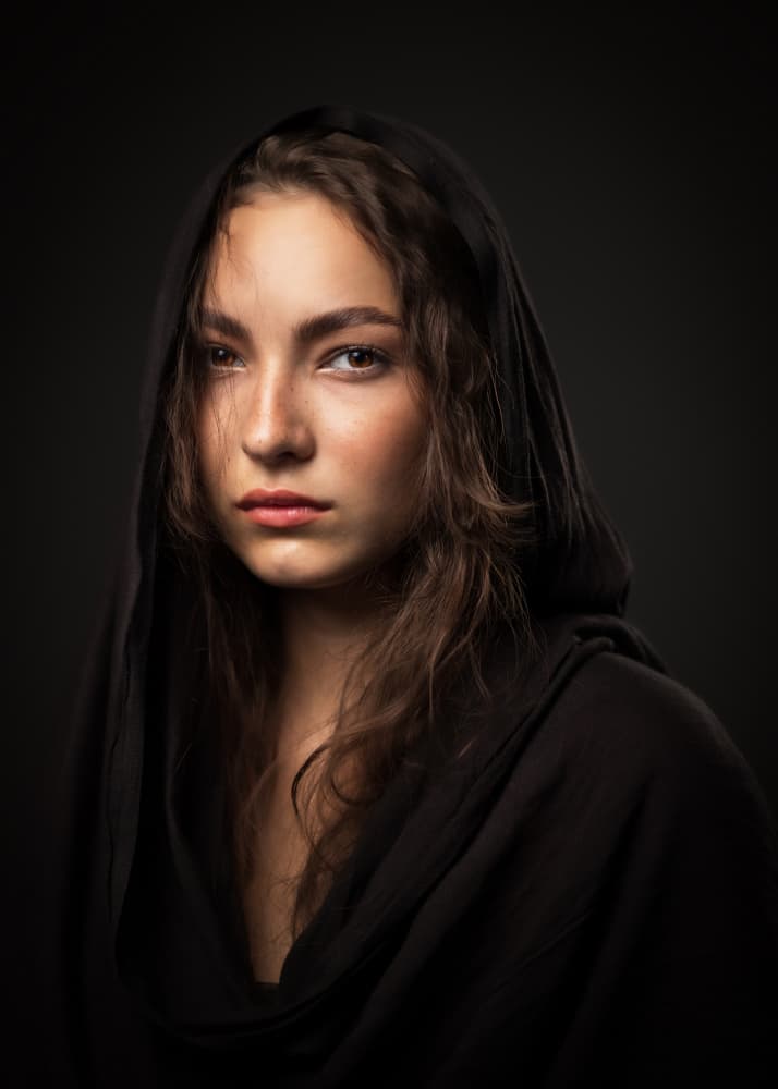 Mysterious Hooded Woman by Robert Girmencea — canvas wall art