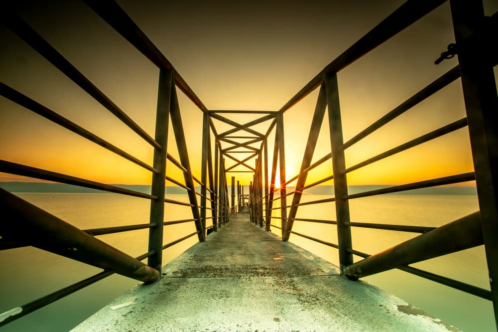 Long Pier Golden Sunset by Wisam Hassan — canvas wall art