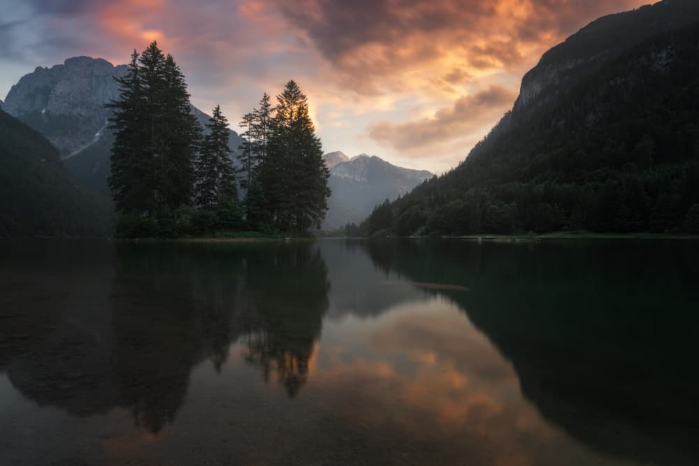 Dramatic Lake Sunset Reflection by Thomas de Franzoni — canvas wall art