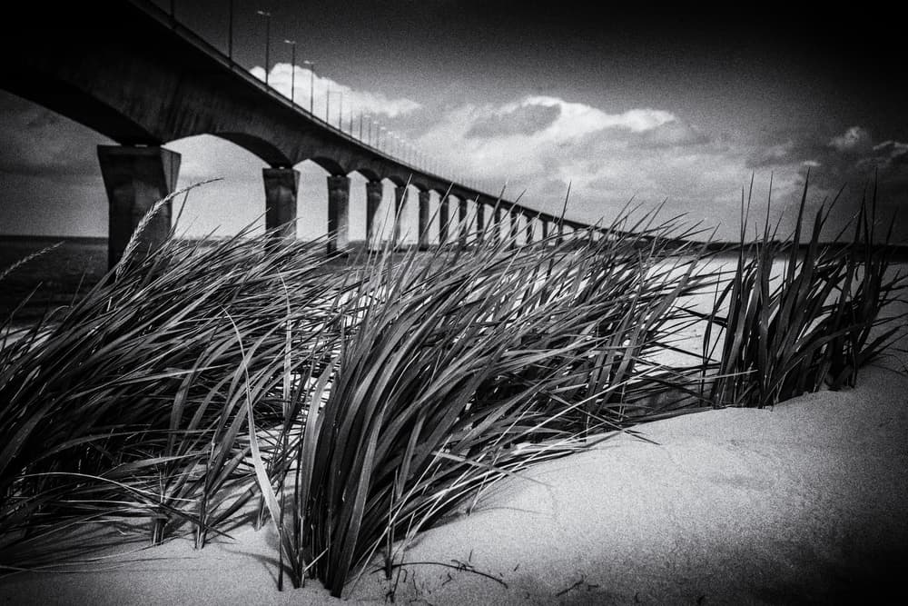 Dramatic Coastal Bridge by Luc Vangindertael (laGrange) — canvas wall art