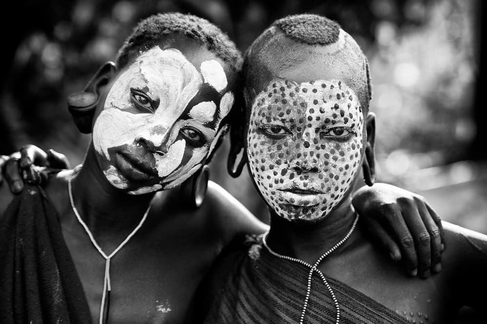 Painted Tribal Faces by Trevor Cole — canvas wall art