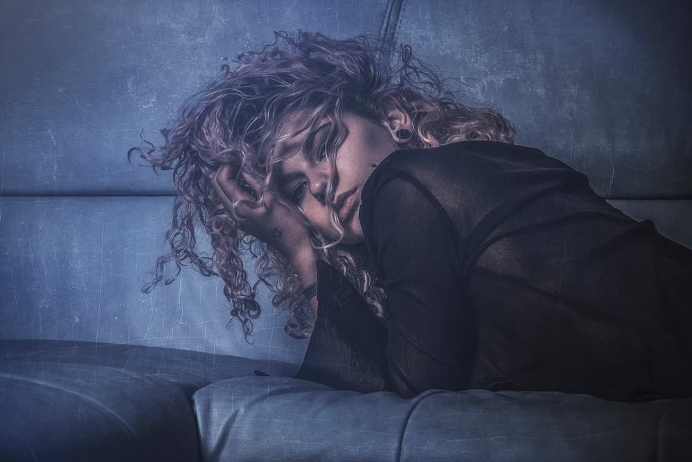 Pensive Woman Resting by Traven Milovich — canvas wall art