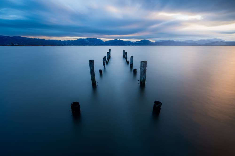 Tranquil Pier Posts by Pamela Doretti — canvas wall art