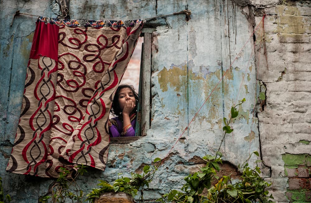 Curious Girl Window by Prateek Dubey — canvas wall art