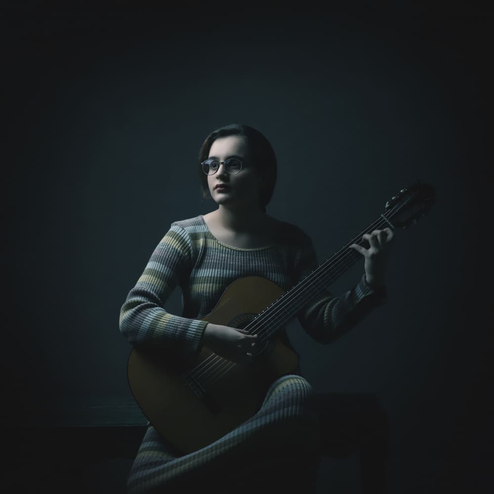 Pensive Guitarist Portrait by Moein Hasheminasab — canvas wall art