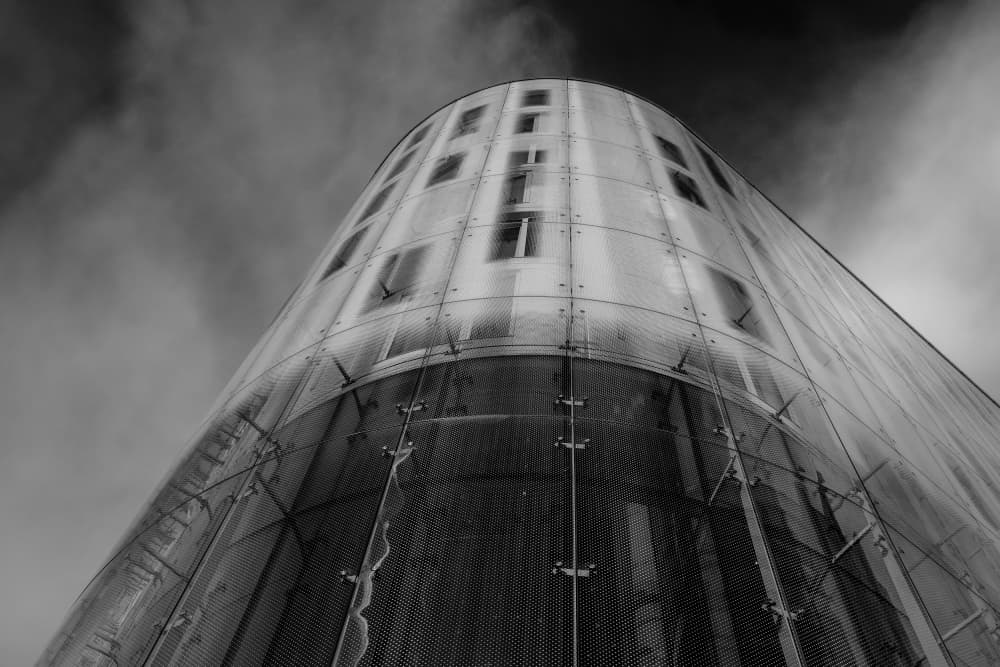 Dramatic Curved Glass Building by Chris Hamilton — canvas wall art