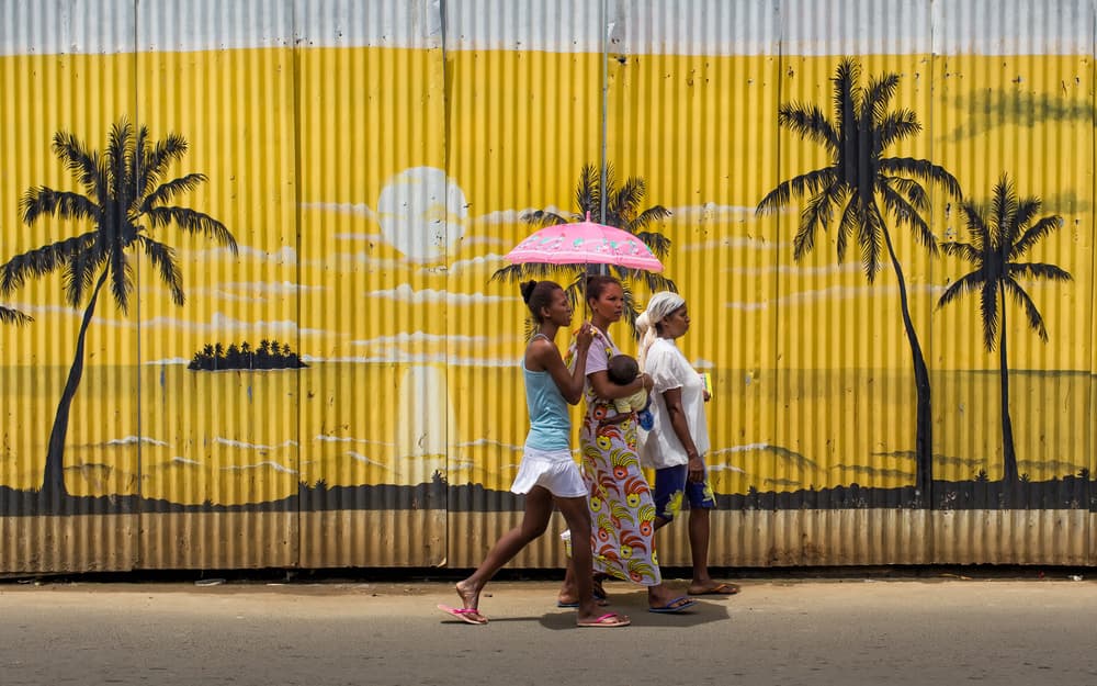 Pink Umbrella Tropical Walk by Gloria Salgado Gispert — canvas wall art