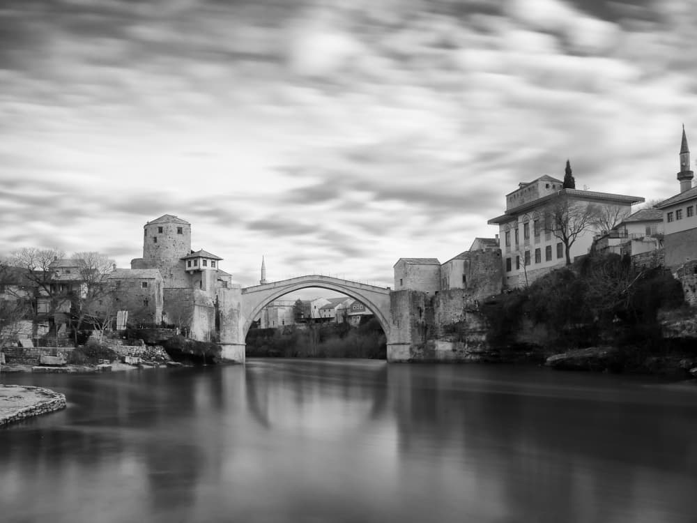 Mostar Bridge Serene Waters by Marko Buntic — canvas wall art