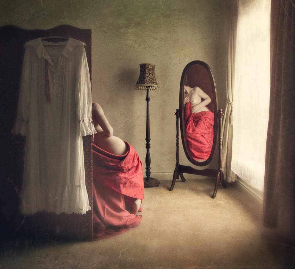 Intimate Reflection in Red by Magdalena Russocka — canvas wall art