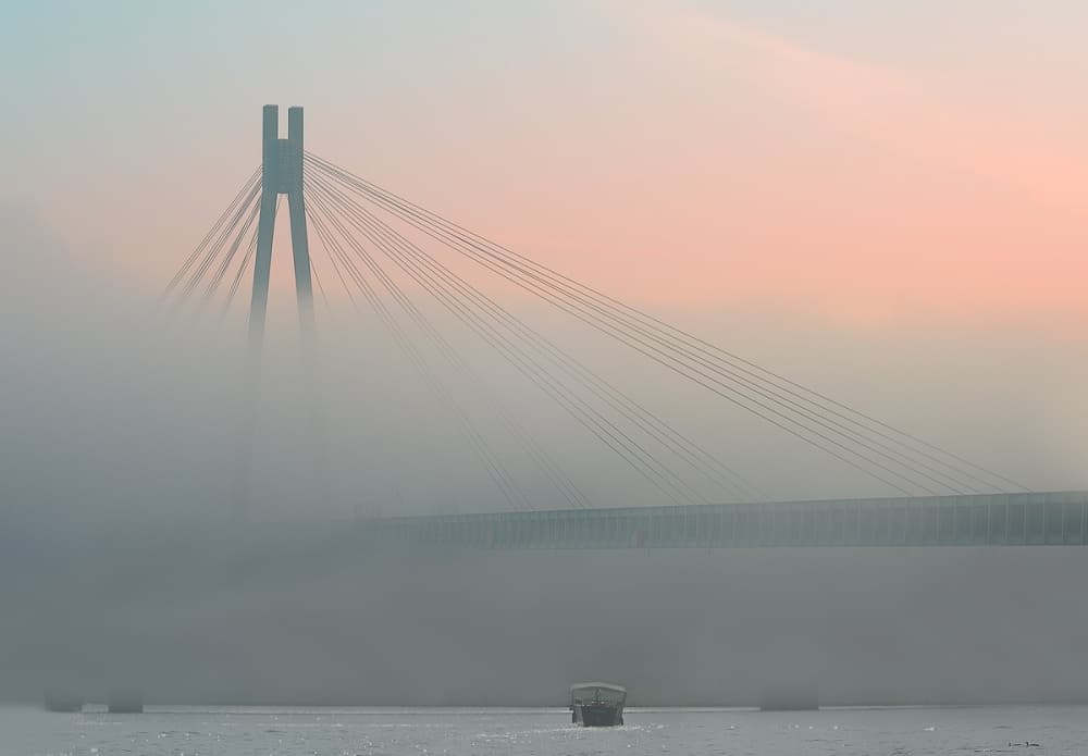 Misty River Bridge by paralaxa — canvas wall art