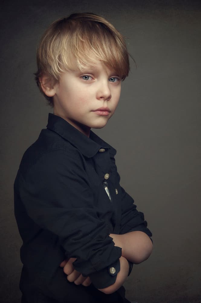 Pensive Young Boy by Monika Vanhercke — canvas wall art