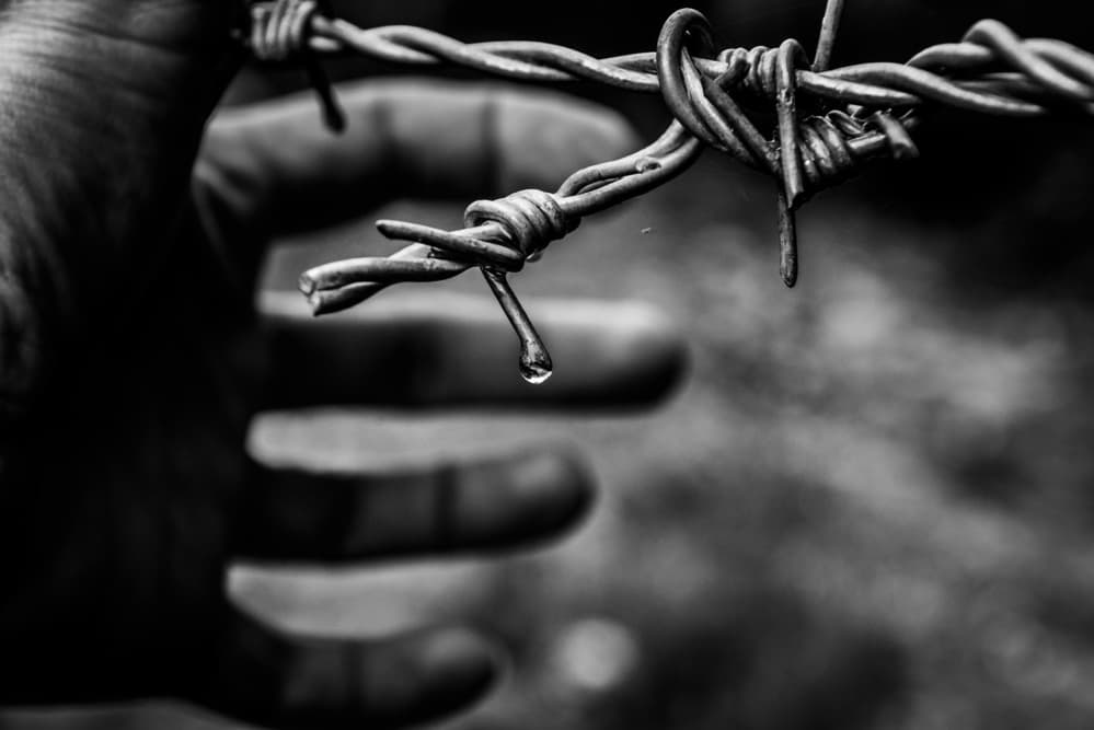 Barbed Wire Droplet Hand by RABIA BASHA ARTIST — canvas wall art