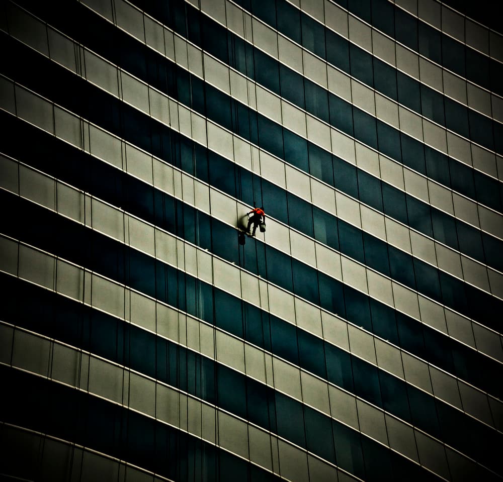 Skyscraper Window Washer by Erik Schottstaedt — canvas wall art