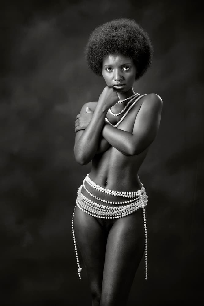 Afro Woman With Pearls by Hugh Wilkinson — canvas wall art