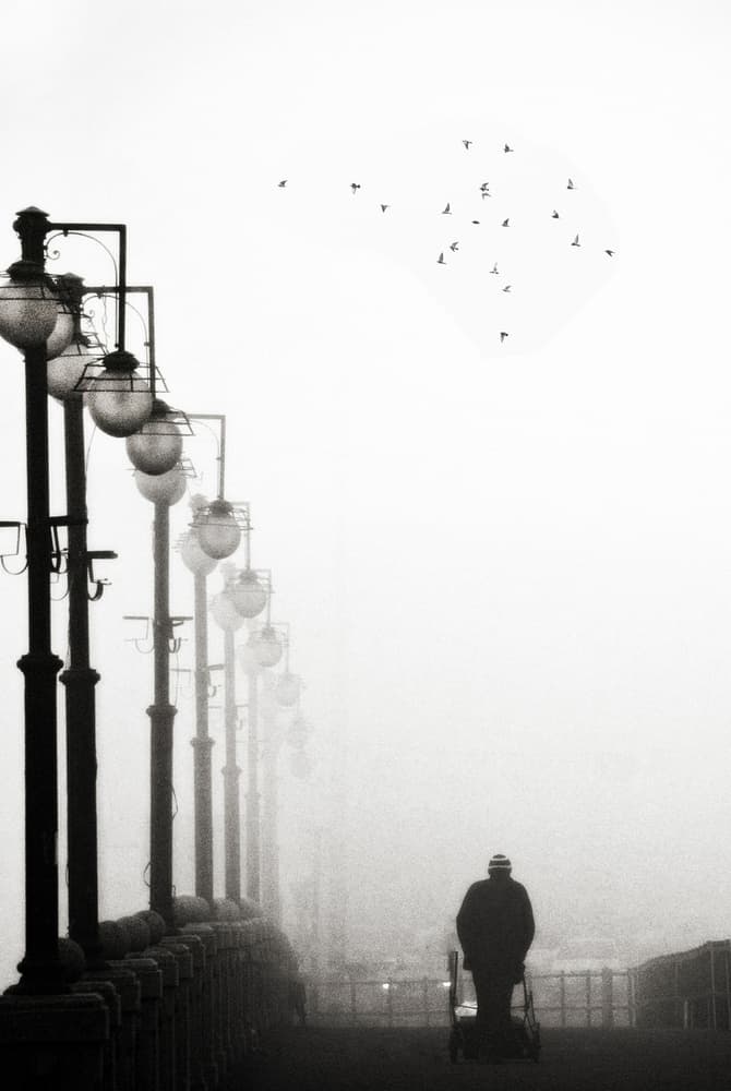 Solitary Figure Foggy Pier by Nicoleta Gabor — canvas wall art