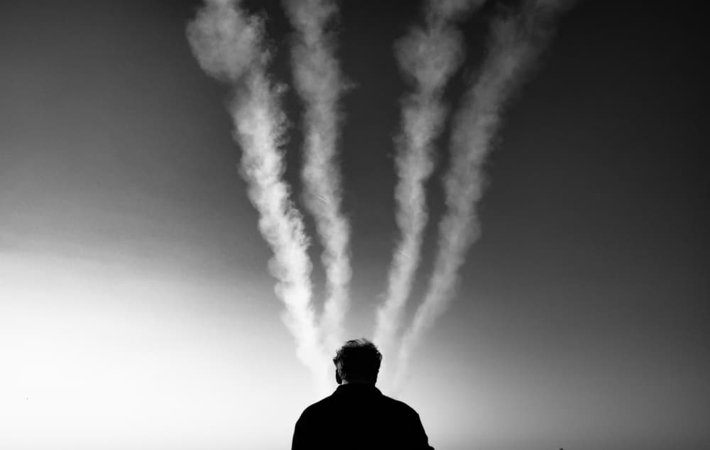 Man and Rising Smoke by Ali Ayer — canvas wall art