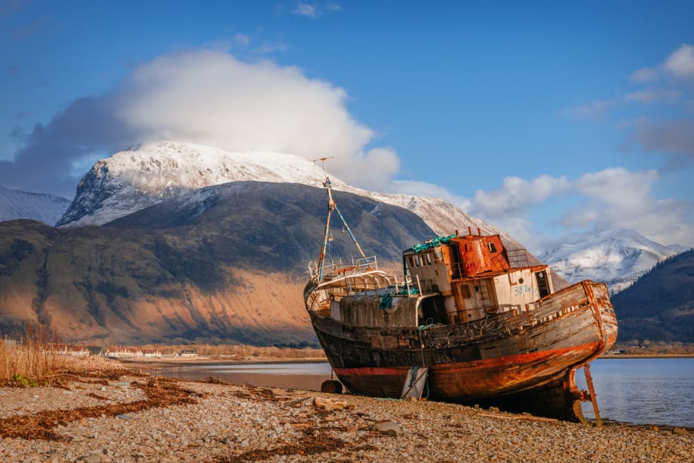 Snowy Mountain Boat Wreck by Adrian Popan — canvas wall art