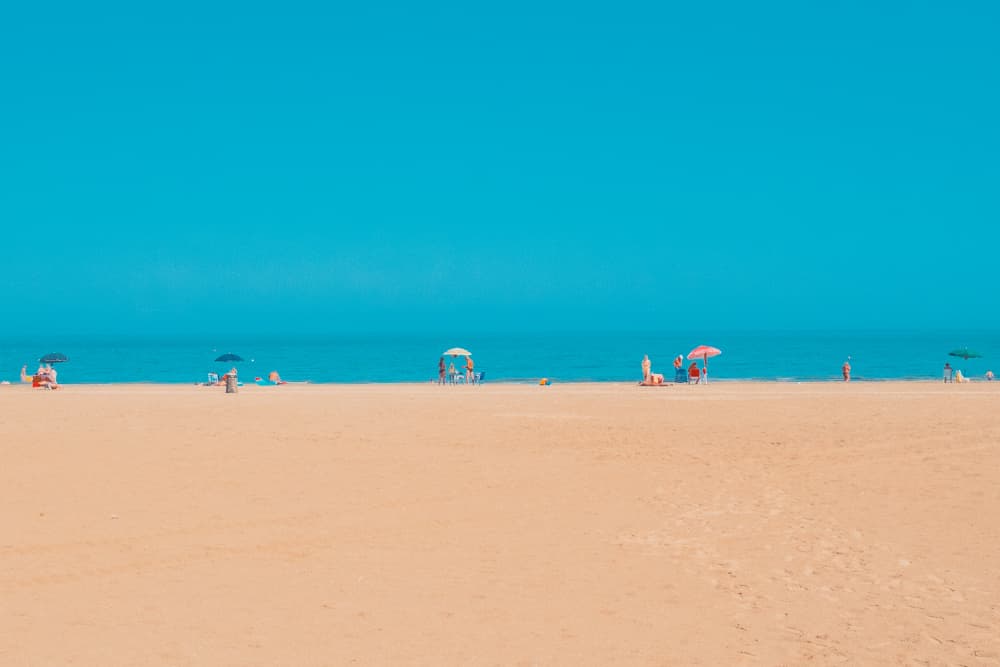 Serene Summer Beach by Roberto Ruoli — canvas wall art