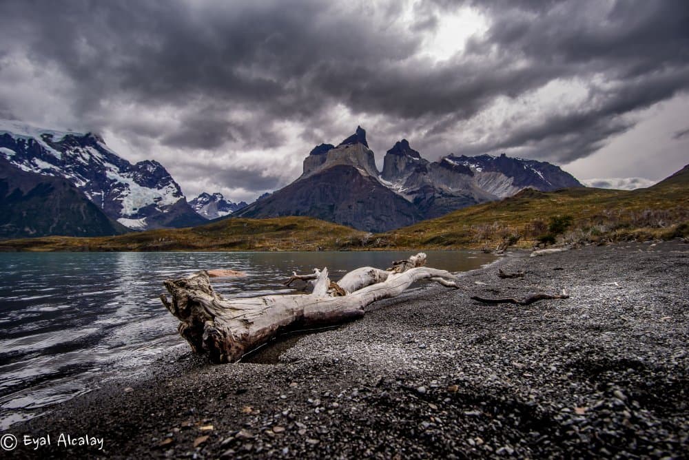 Dramatic Mountain Lake Shore by Eyal Alcalay — canvas wall art
