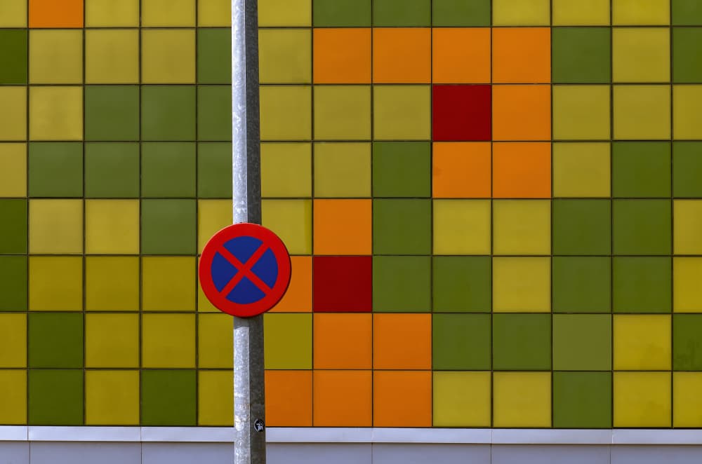 Colorful Tiled Street Sign by Wim Schuurmans — canvas wall art