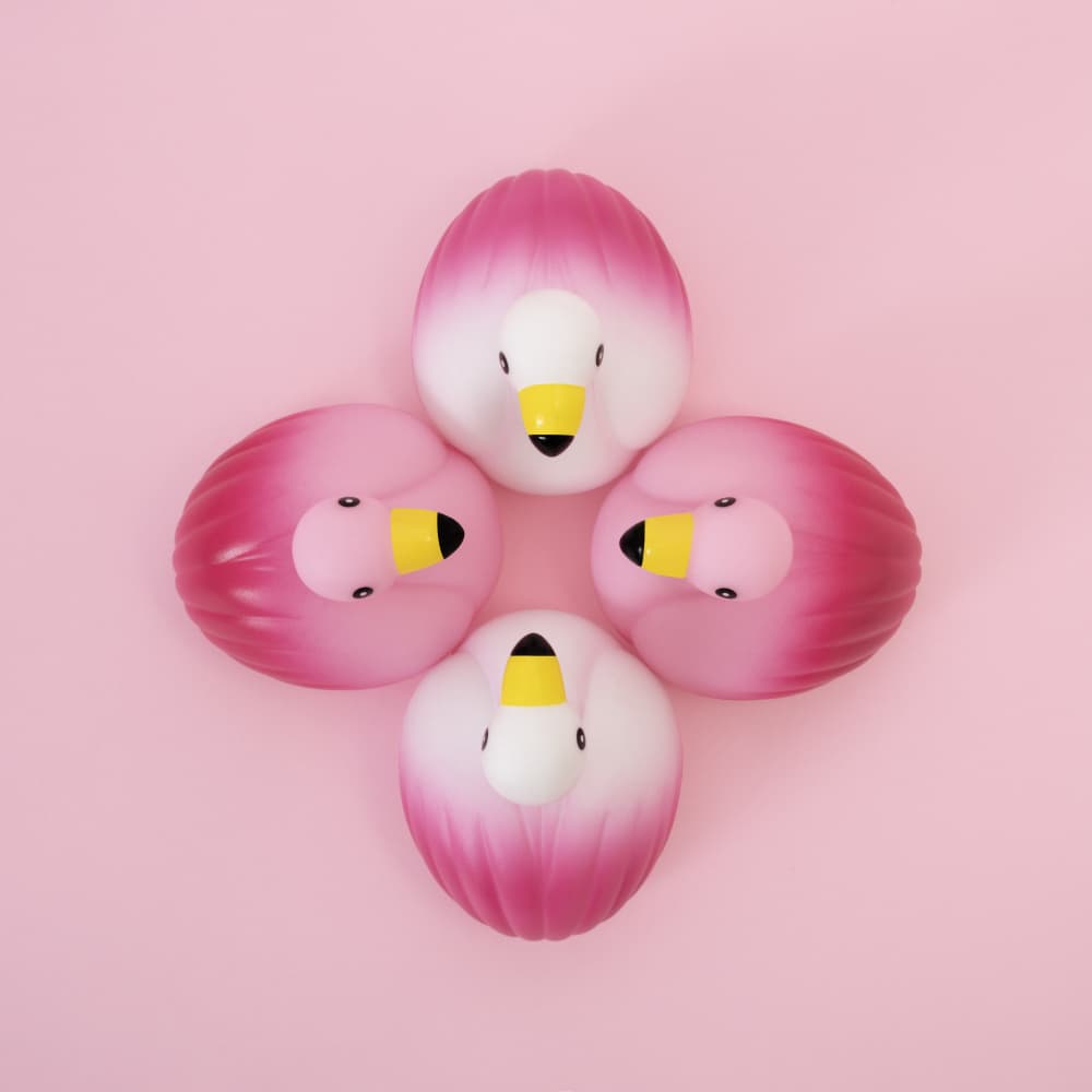 Playful Pink Flamingos by Julia Ramiro — canvas wall art