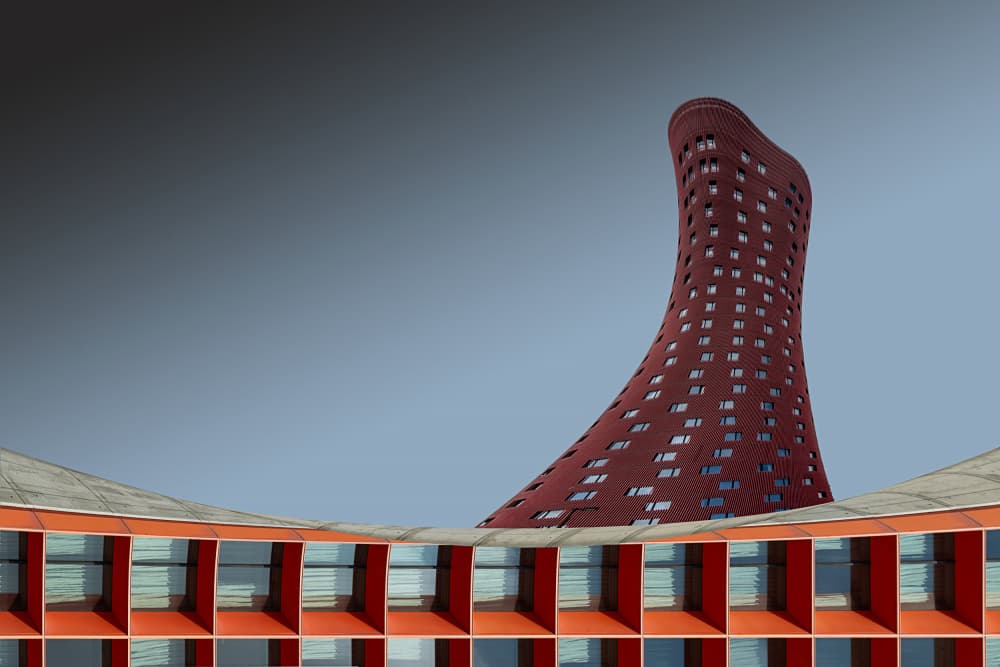 Red Curved Building by Roland Weber — canvas wall art