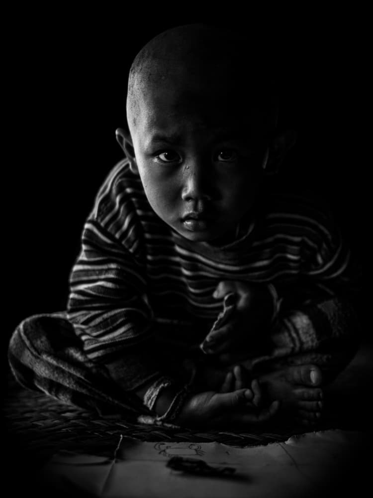 Pensive Young Boy by Marco Tagliarino — canvas wall art