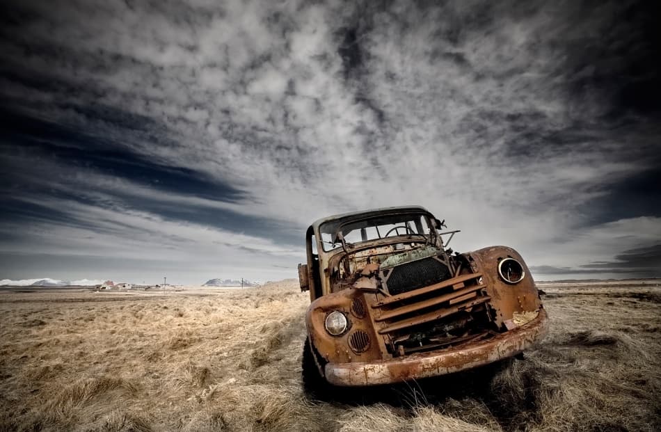 Rusty Truck Dramatic Sky by Bragi Ingibergsson - BRIN — canvas wall art