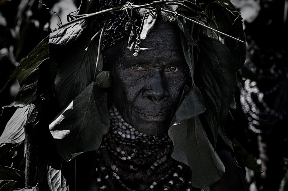 Indigenous Woman with Leaves by Joxe Inazio Kuesta Garmendia — canvas wall art