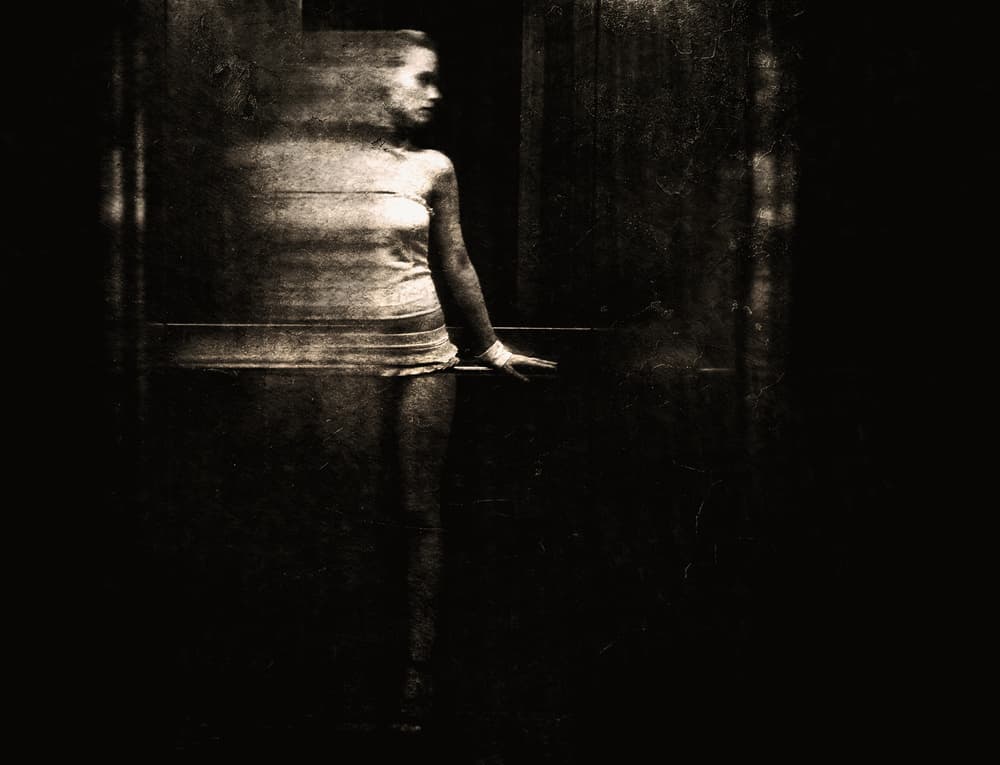 Fading Woman In Darkness by Erkan Camlilar — canvas wall art
