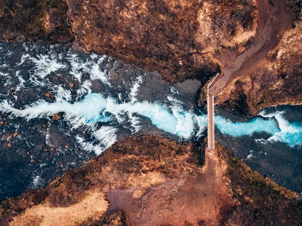 Turquoise River Bridge by Antonio Carrillo Lopez — canvas wall art