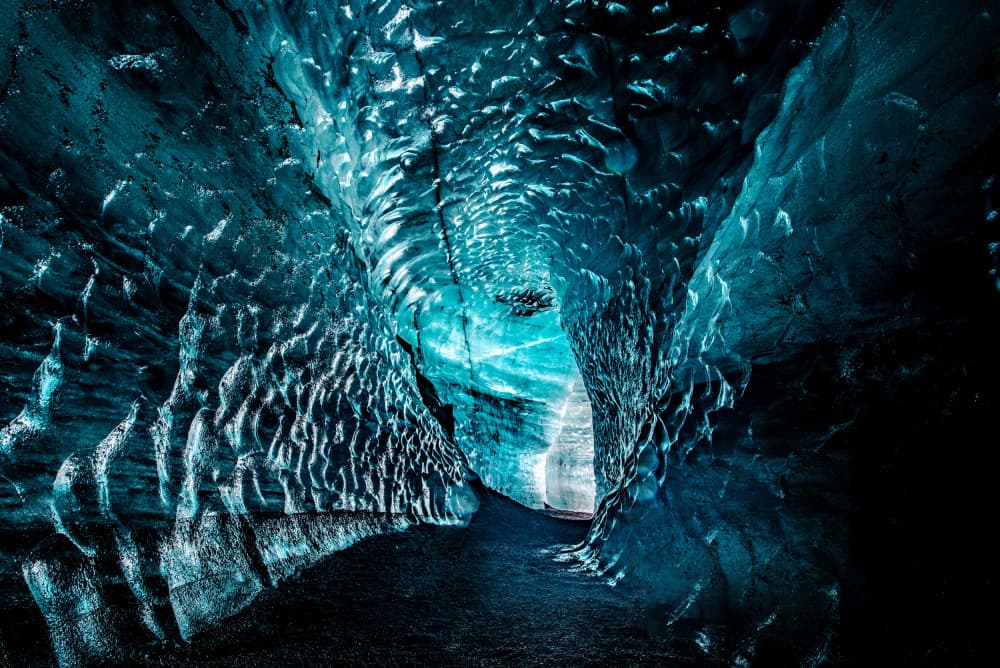 Crystal Blue Ice Cave by Faris Saieda — canvas wall art