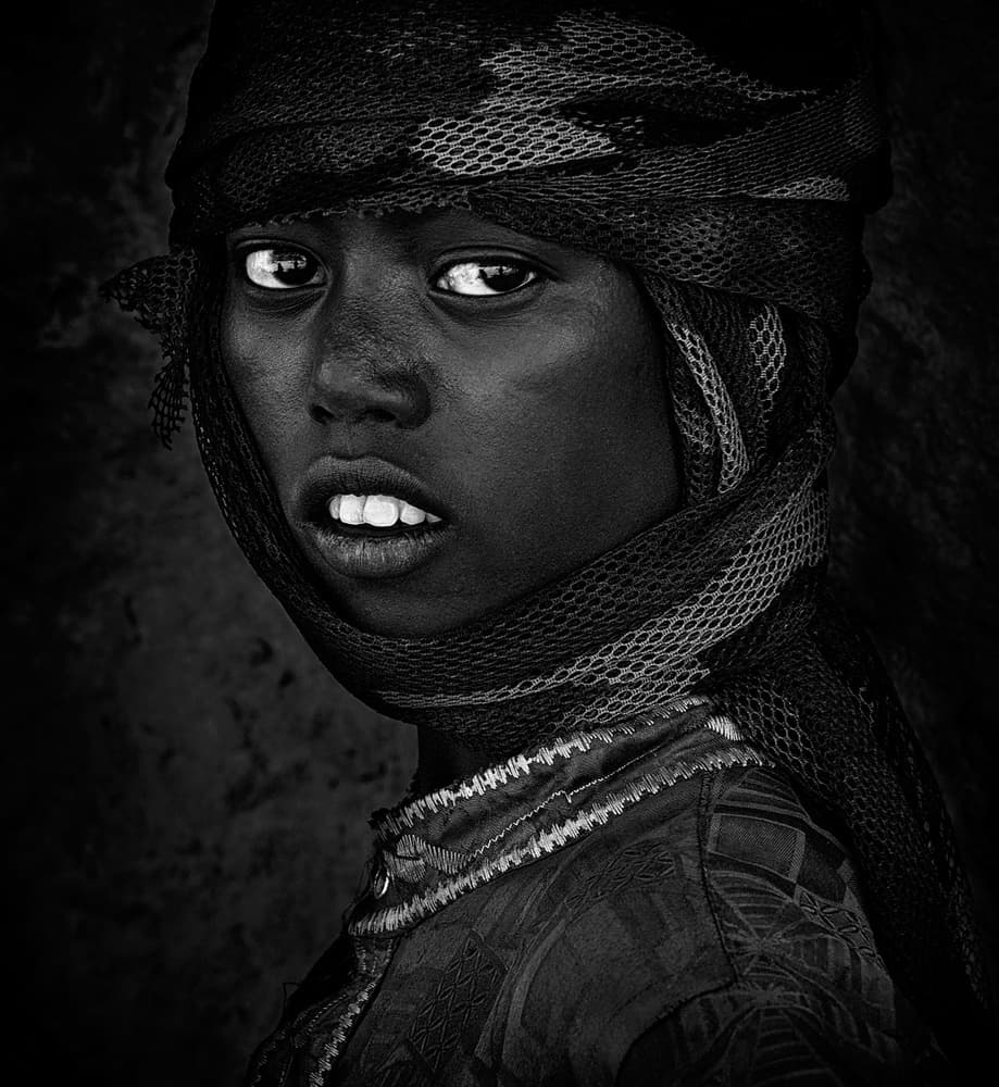 Intense Child Gaze by Joxe Inazio Kuesta Garmendia — canvas wall art