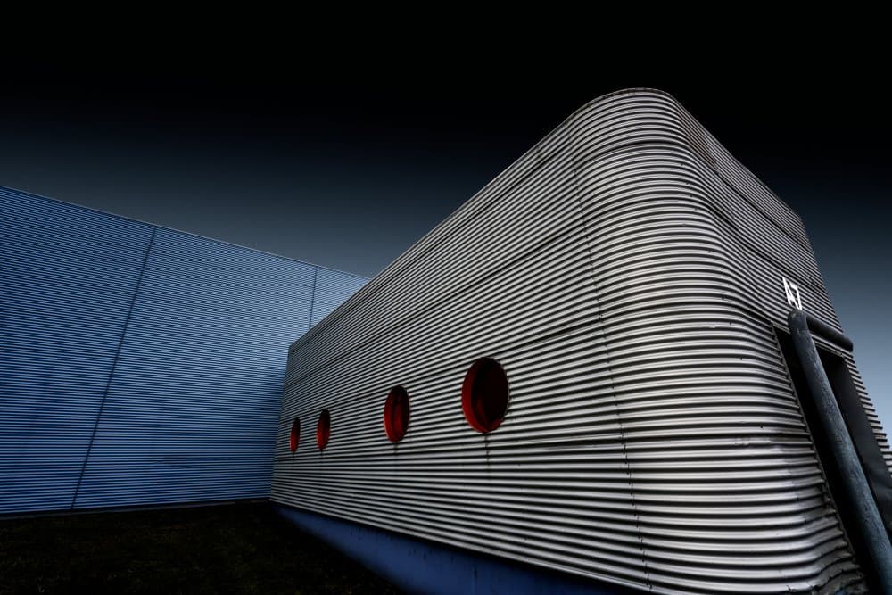Red Porthole Architecture by Roland Weber — canvas wall art