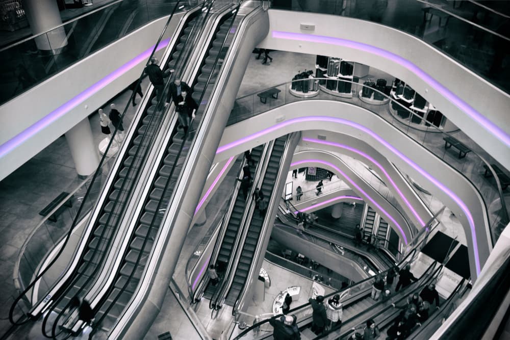 Purple Lit Escalators by Alexander Kiyashko — canvas wall art