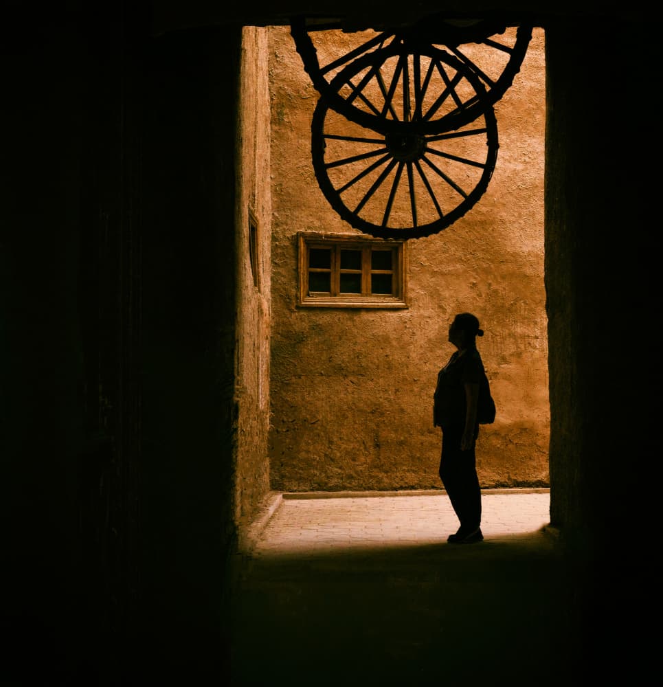 Silhouette Beneath Wheels by Rae Zhang — canvas wall art